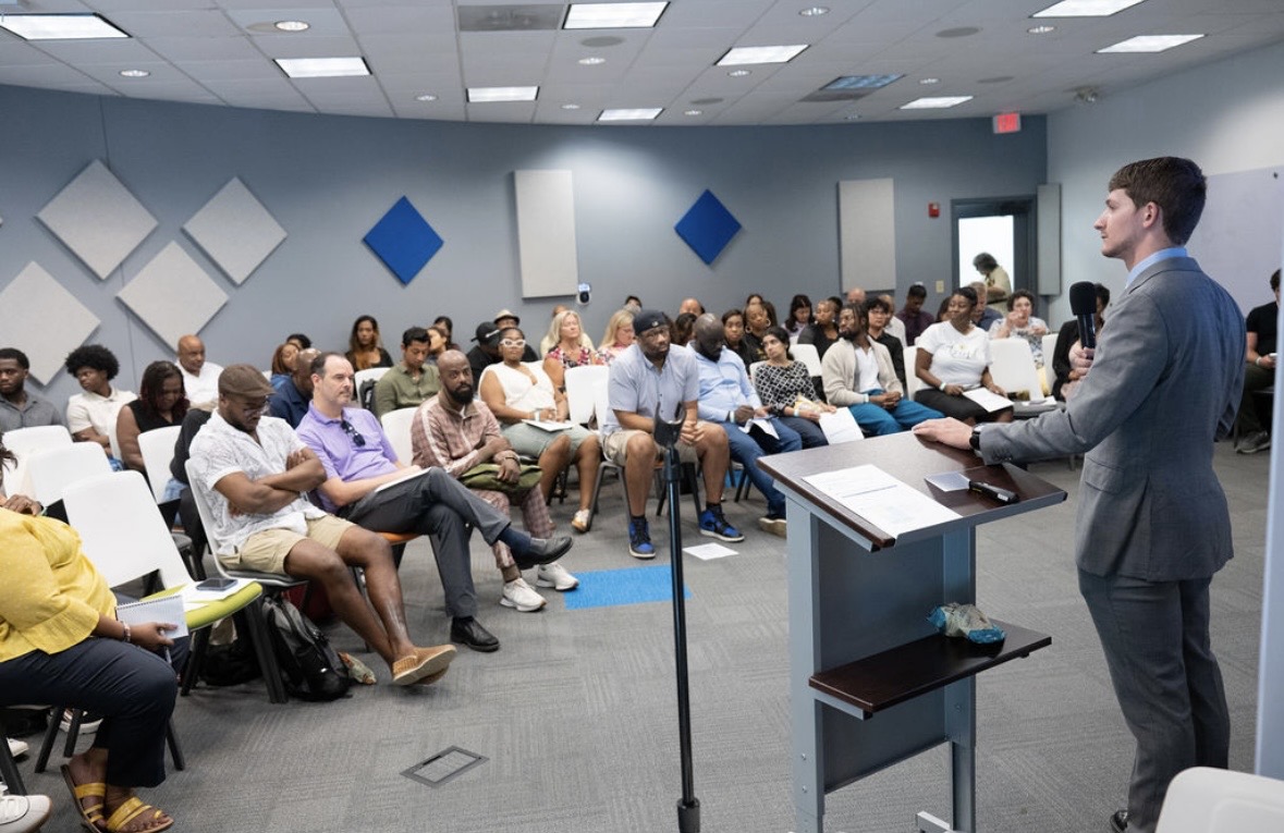 Perry Luzier addressing a full audience at Atlanta Tech Park