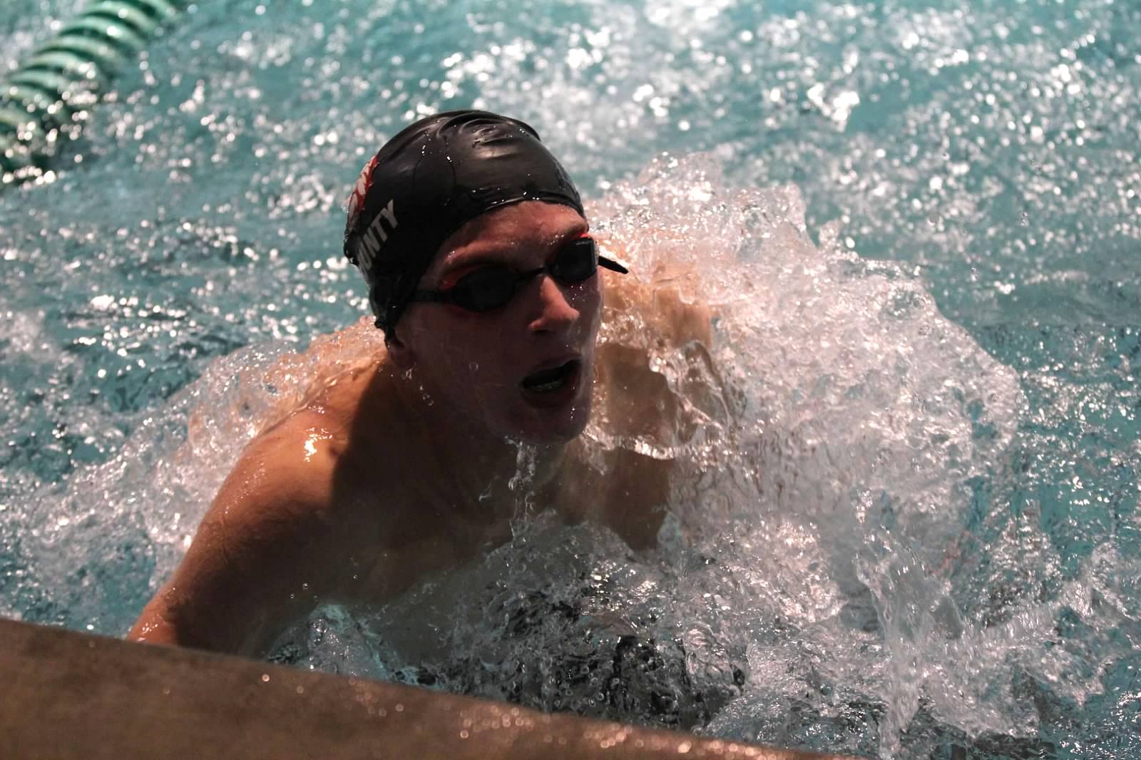 Perry swimming in competition