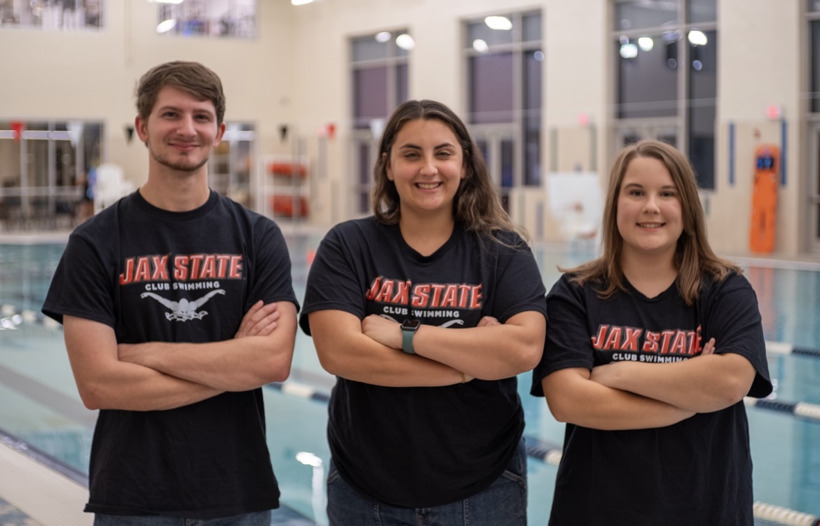 Perry with swim team members